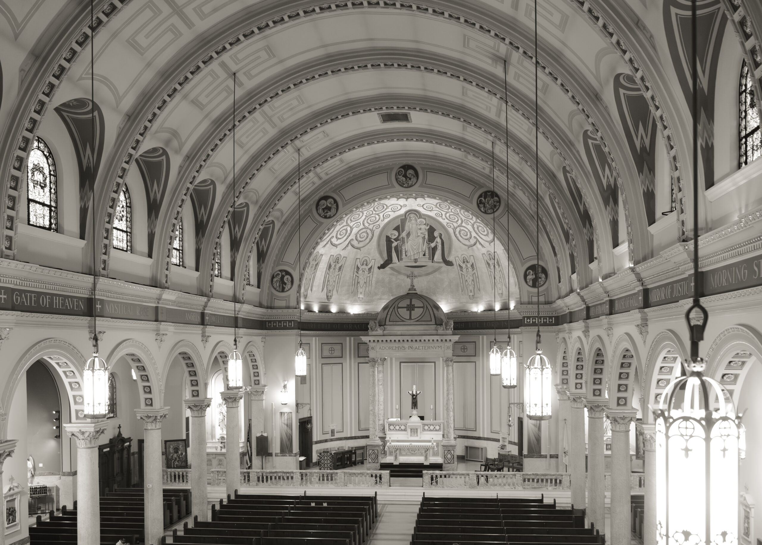 A Black and white image of Our Lady of the Rosary, a historic church in downtown Dayton Ohio, before a catholic wedding ceremony.