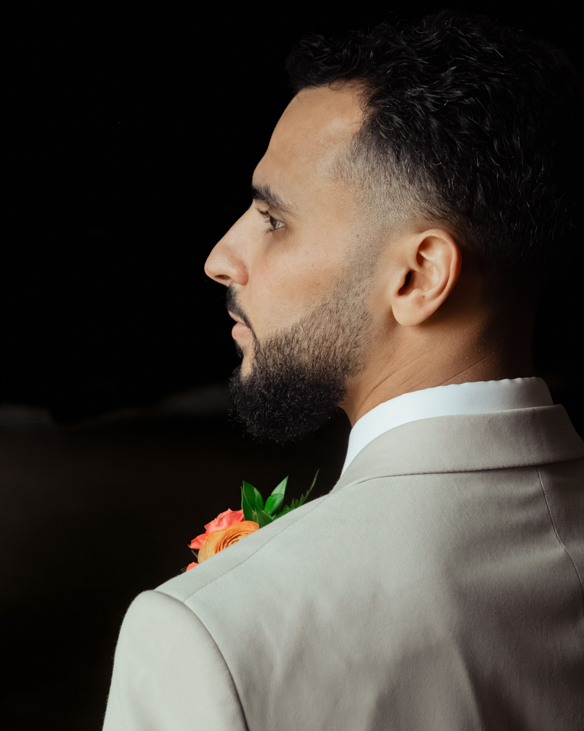 A groom poses for a close up portrait at Holy Family catholic church in Nashville ahead of his catholic wedding Mass.