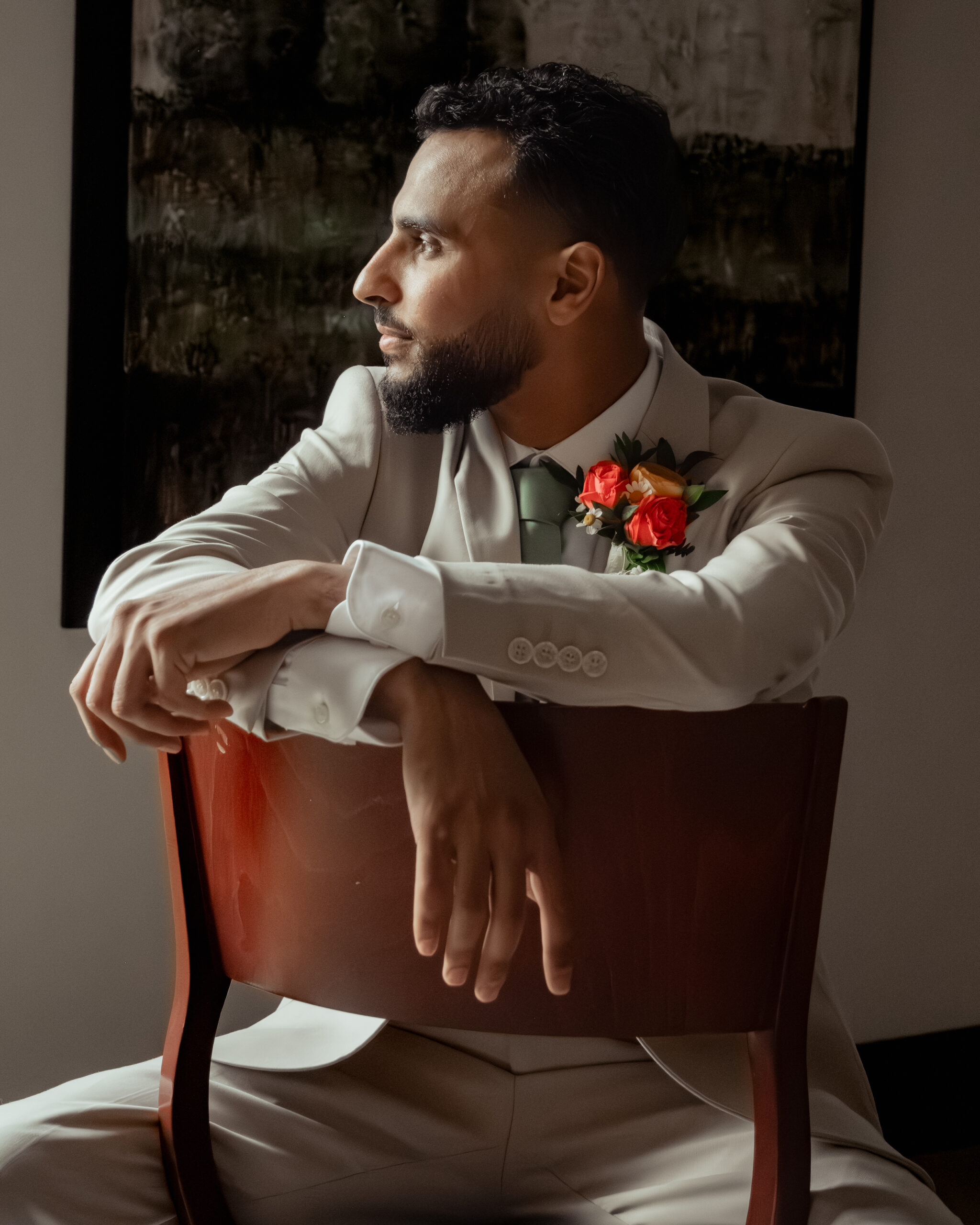 A groom poses for a close up portrait at Holy Family catholic church in Nashville ahead of his catholic wedding Mass.