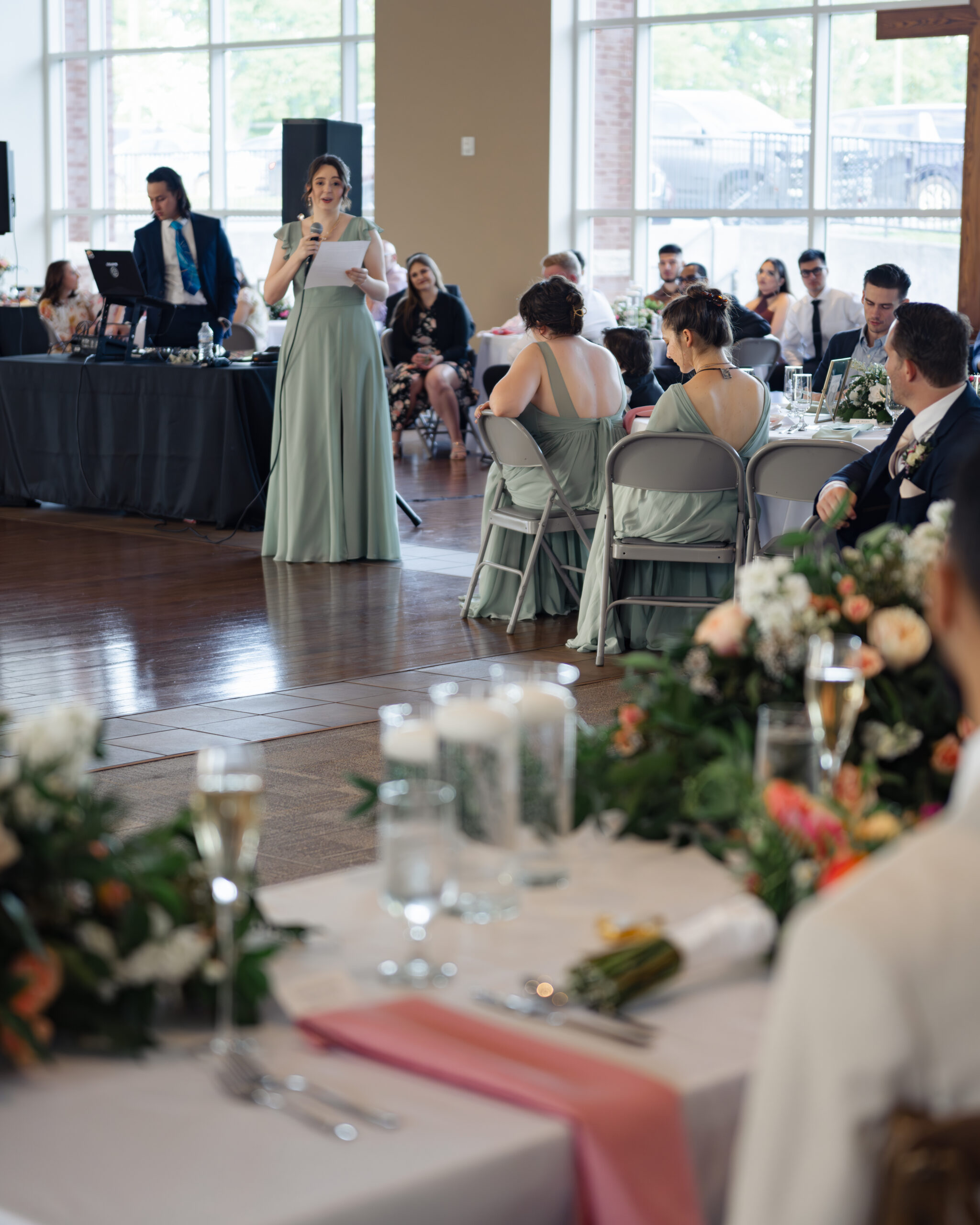 The sister of the bride gives a heartfelt toast at holy family catholic church in brentwood, tn