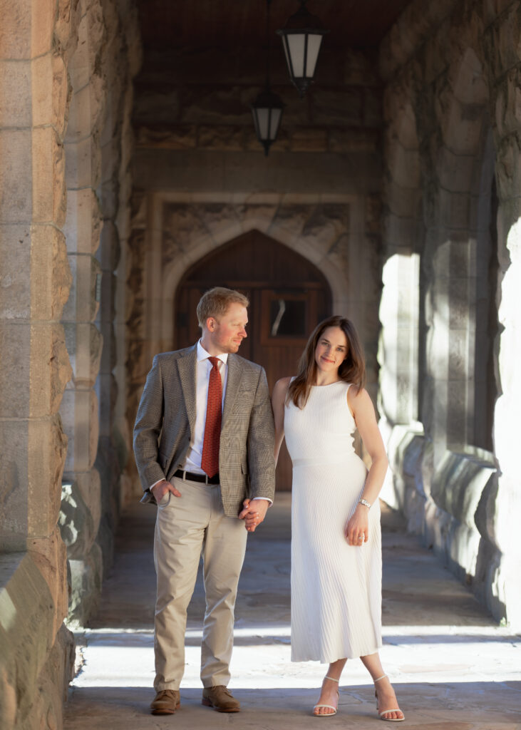 a catholic couple poses at sewanee university of the south for an editorial engagement session ahead of their catholic wedding at the basilica of sts. peter and paul in chattanooga, tn